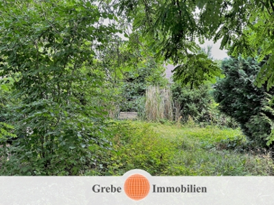 Grüne Oase mit Abriss DHH im afri. Viertel für Ihren Neubau.